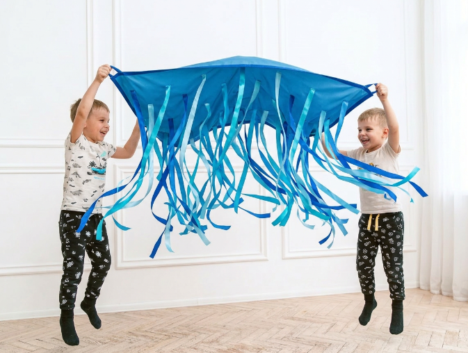 Chusta animacyjna 1,45 x 1,45 m ze wstążkami WODA